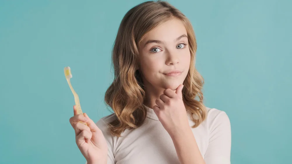 Why Are My Teeth Yellow Even Though I Brush? Causes & Solutions